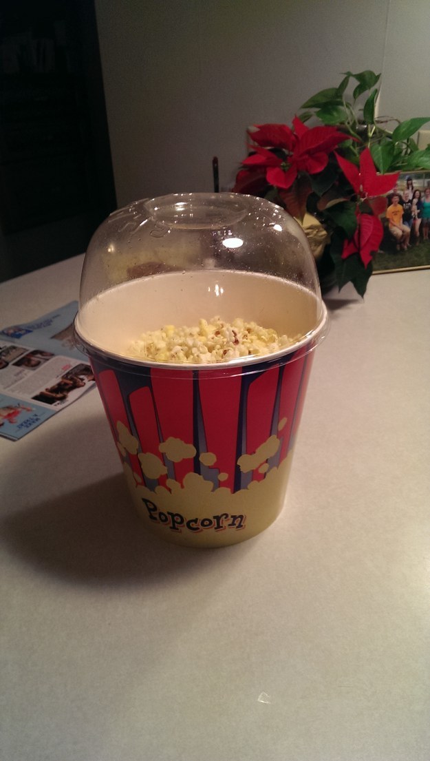 And this popcorn bucket that comes with a lid you can use to shake butter all over it AND as a bowl.