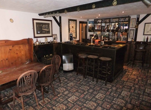 It's a totally real, functioning pub. This sold for £249,950.