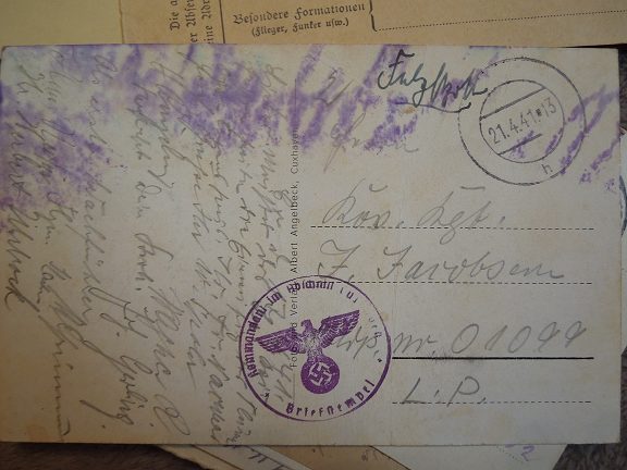 A postcard with the Nazi symbol stamped onto it. Precious.