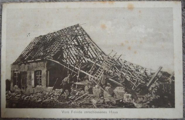 This card is from 1944, and it reads, "A house destroyed by the enemy."