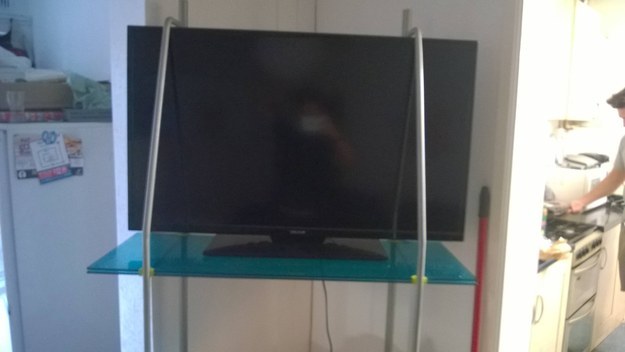 The landlord who bought a new TV but didn't take the stand size into account.