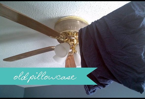 Use an old pillowcase to clean your ceiling fan.