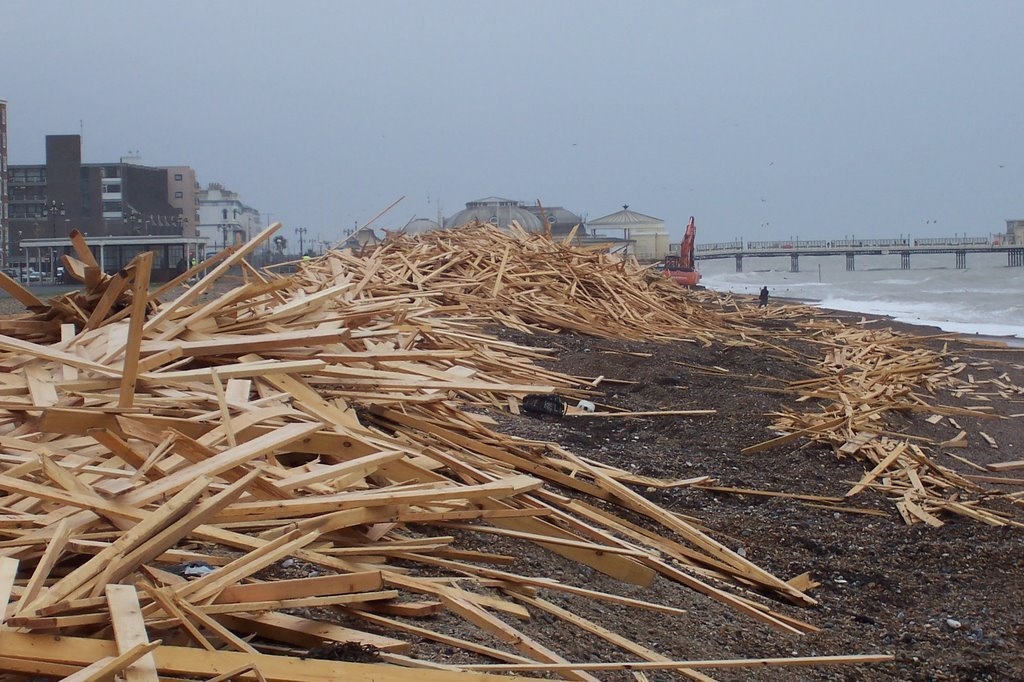 Tons of timber washed on to the shore of Worthing Beach, Sussex in the United Kingdom. 