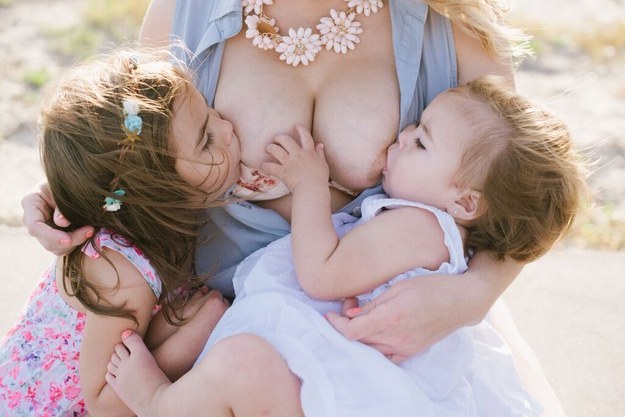 A mom in Texas is getting a lot of attention online after she breastfed both of her young daughters at once during a stunning photoshoot.
