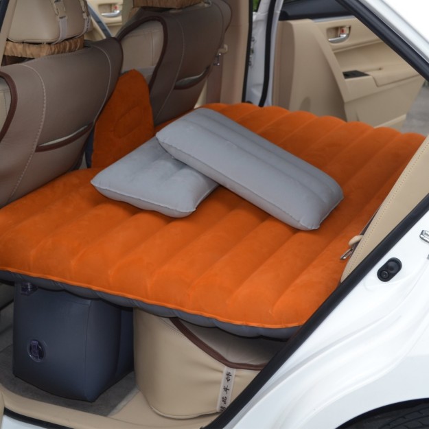 This inflatable air bed ($80) that fits into the backseat of your car.