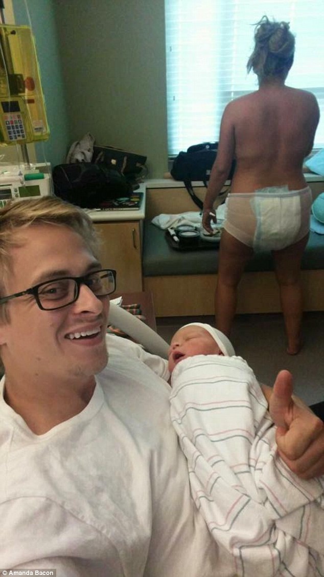 Brave: A mother has been praised for posting a photo of 'uncensored motherhood' showing herself wearing a 'giant mom diaper' shortly after giving birth