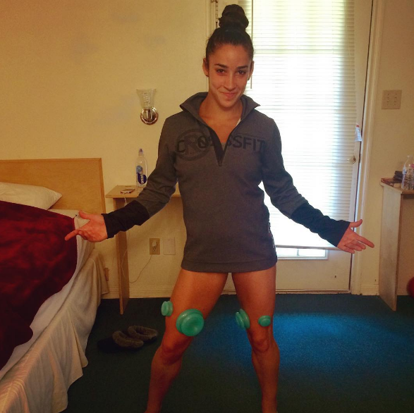 This picture of Aly Raisman cupping her knees, because apparently knee cupping is a thing: