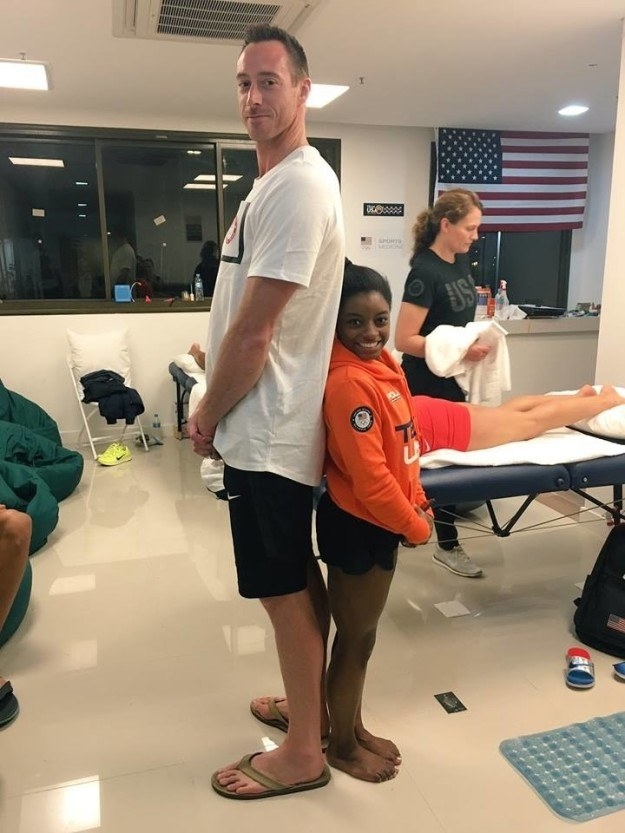 This picture of David Lee, who is 6’8” and plays indoor volleyball for Team USA, and Simone Biles, who is is 4’8” and the best gymnast in the world:
