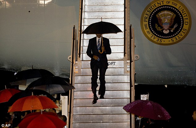 President Barack Obama on Monday became the first sitting U.S. president to step foot in the isolated Southeast Asian nation of Laos. He stepped off of Air Force One in a deluge 