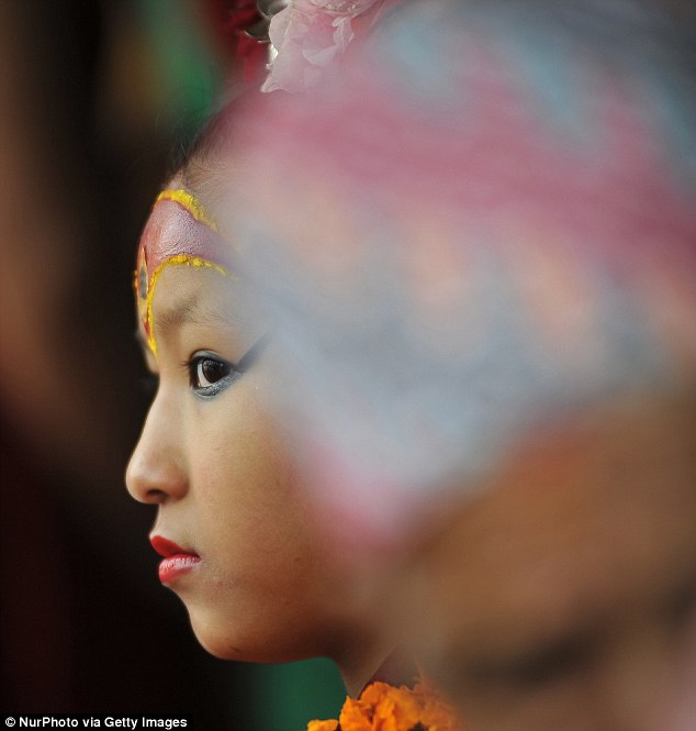 Candid shot of a Nepalese goddess. Yunika will revert back to civilian society before she hits puberty 