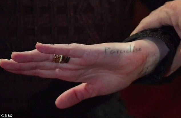 Her happiness: She also has paradise inked on the side of her left hand - and she told her interviewer that the two tattoos are inextricably linked