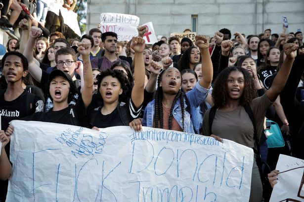 Berkeley High School students assemble on the UC Berkeley campus in protest to the election of Republican Donald Trump as President of the United States