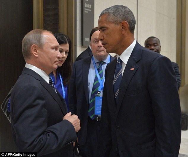 Frosty: Russian President Vladimir Putin has spoken today of the 'crisis' state of US-Russian relations, illustrated by the body language in this pictured of the leader with President Barack Obama at the G20 Leaders Summit in Hangzhou in September