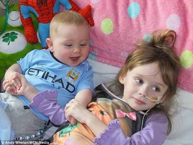 Jessica was told she had just weeks to live. She is pictured lying down with her young brother James