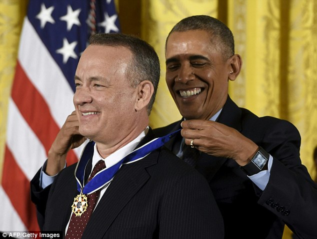 The movie 'Sully' taught him to never travel with  actor Tom Hanks (left), President Obama said at today's Medal of Freedom ceremony 