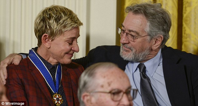 It's okay: The comedienne, 58, was seated next fellow recipient Robert De Niro who provided a reassuring hug for the tearful star