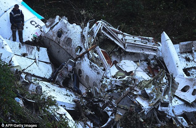 Investigators say it is 'very suspicious' that the plane did not explode on impact as it smashed into a mountain on its way from Bolivia to the Colombian city of Medellin