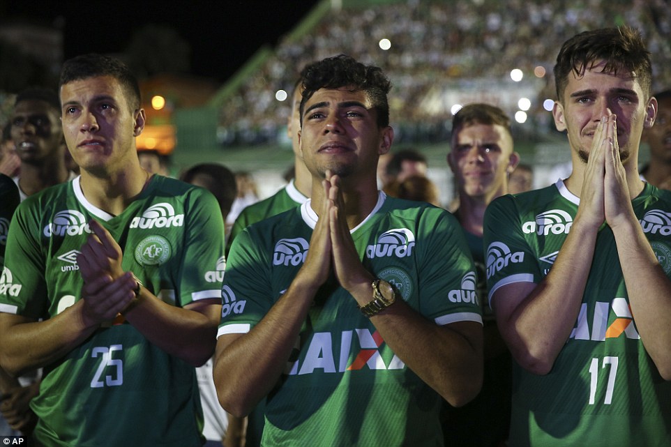 Heartbreaking pictures show the moment footballers broke down in tears as they gathered with family and fans to remember teammates wiped out in a devastating plane crash in Colombia
