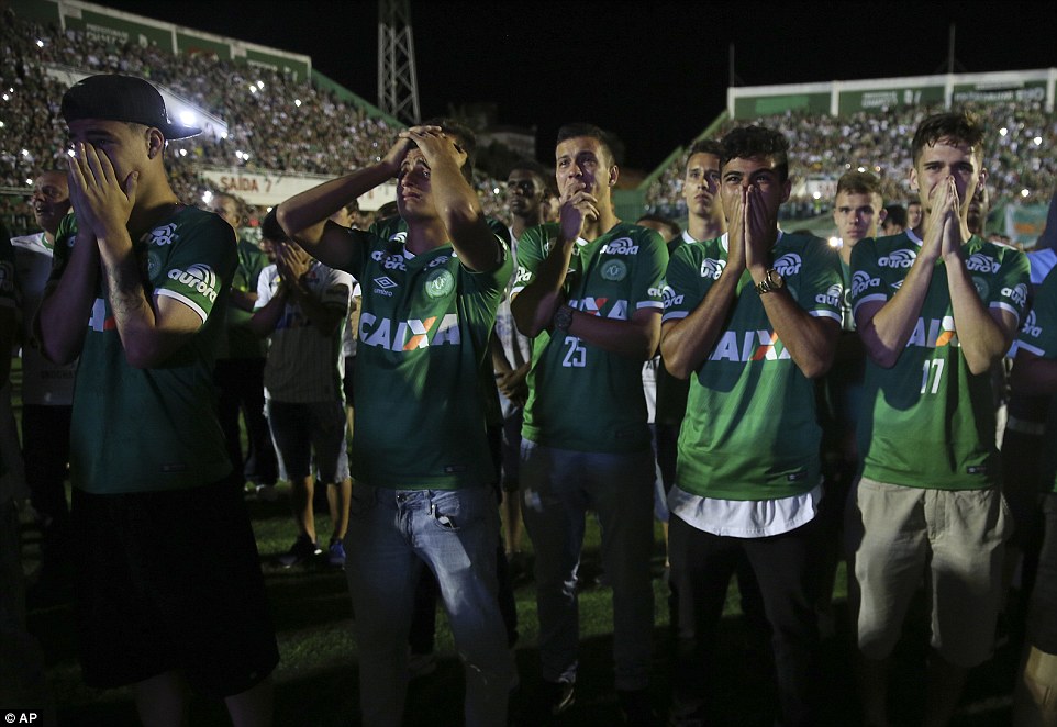 Mourning: Chapecoense soccer players who did not travel with the team on a flight to Colombia that crashed, broke down in tears during a tribute to the crash victims