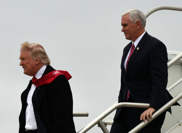 On Thursday, President-Elect Donald Trump arrived at the Indianapolis airport to visit the Carrier plant. During his ~windy~ arrival the back of his tie was ~revealed.~