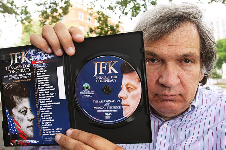 Robert Groden lectures and sells printed and digital material about the Kennedy assassination in Dealey Plaza on weekends.
