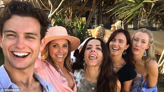 Wedding celebrations! Margot's brother Cameron, who flew back to Queensland on Saturday, was tagged in a photo at their wedding party with four of her friends 