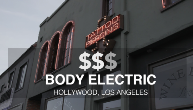 Next up, was Body Electric Tattoo in Hollywood, CA which has been open since 1992. For this tat, Ben wanted to draw on another classic: Willy Wonka. He decided on getting the elevator that they crash through the glass ceiling in, but have it soaring through outer space.
