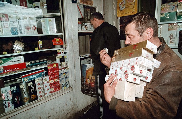 More than half of all Russian men still smoke and the Kremlin grinds its teeth as big American tobacco companies make vast profits at the expense of Russians' health STOCK PHOTO