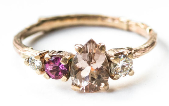 A clustered peach morganite, pink tourmaline, and moissanite ring that'll be the talk of the town.