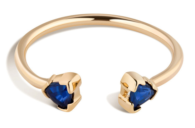 An open-ended sapphire ring that definitely stands for compromise.