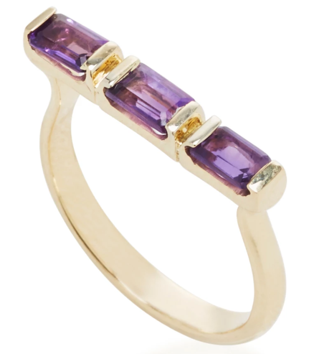 A polished amethyst ring for people who dream of having a vault of *purple* bars.