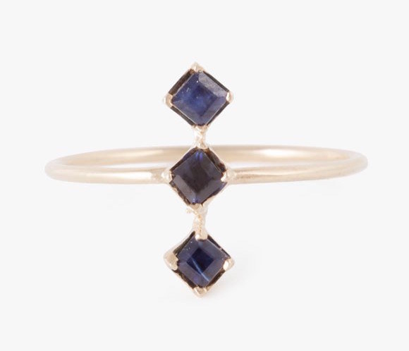 A stacked sapphire ring that looks like a row of miniature baseball diamonds.