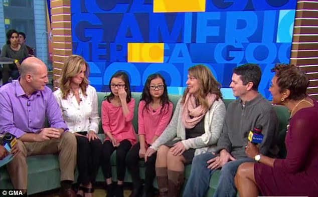 Audrey (third from left) and Gracie sat down with their parents and the hosts of 'Good Morning America' after their emotional reunion. Both cried happy tears when they finally met