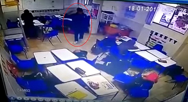 The boy, whom authorities said was 'depressed,' stood in the center of the classroom and raised the gun to his head repeatedly, though it did not fire