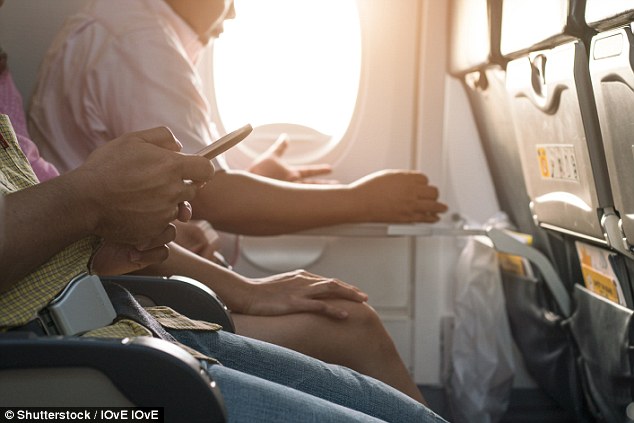 A man left flight crew feeling 'helpless and angry' after he was caught watching hardcore pornography in full view of a 16-year-old girl (stock image) 