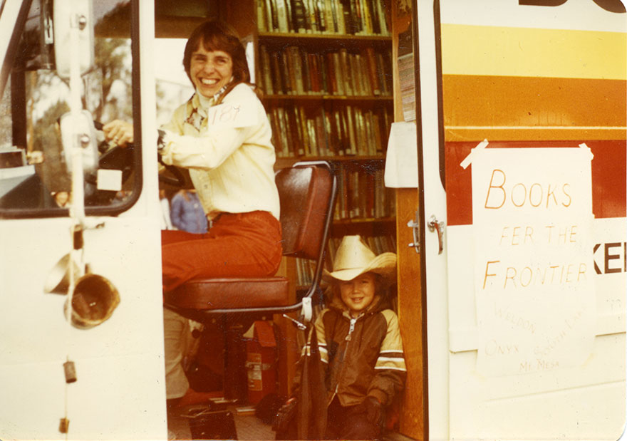 Chris Junapa Standing In The Bookmobile, 1980