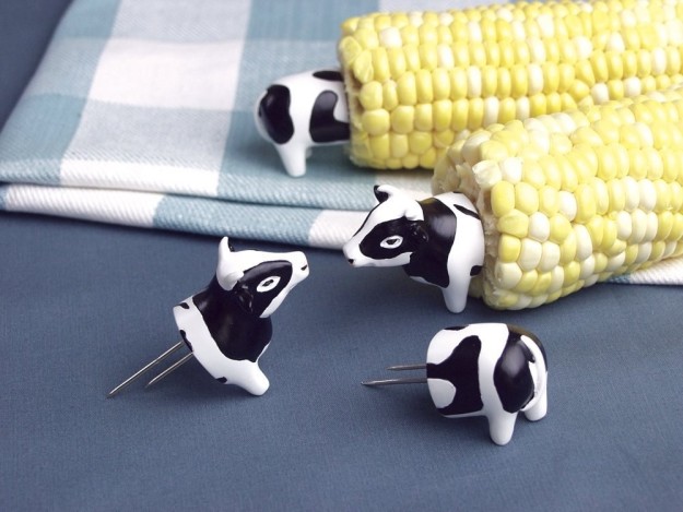 Tiny, gentle cows that do a great job at holding your corn, even if they aren't really ~put together~ themselves.