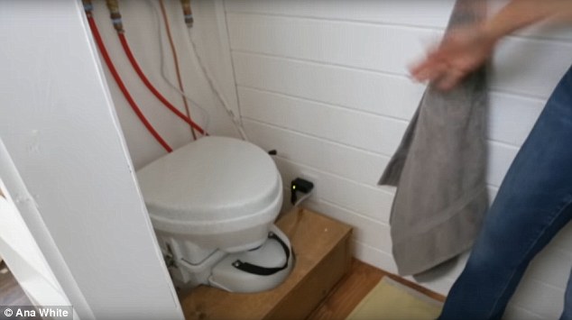 Ana included a compost toilet at the other end of the small bathroom. The tiny home has its own water heater inside 