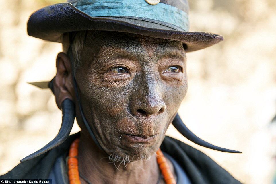 The tattooed face of a former Longwa Village headhunter in India'a Nagaland. Until as recently as the 1960s, these headhunters took great pride in killing their enemies from other tribes then severing and displaying their heads