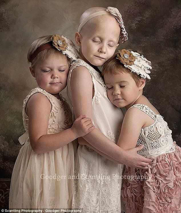 The original: This image of the three girls embracing each other for comfort became an online hit in 2014