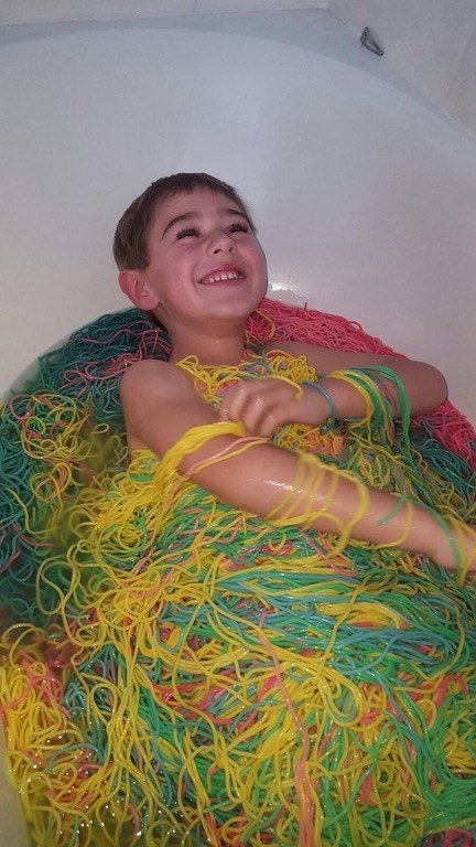 Needless to say, her effort and creativity were well worth it — Dresden loved his spaghetti bath.