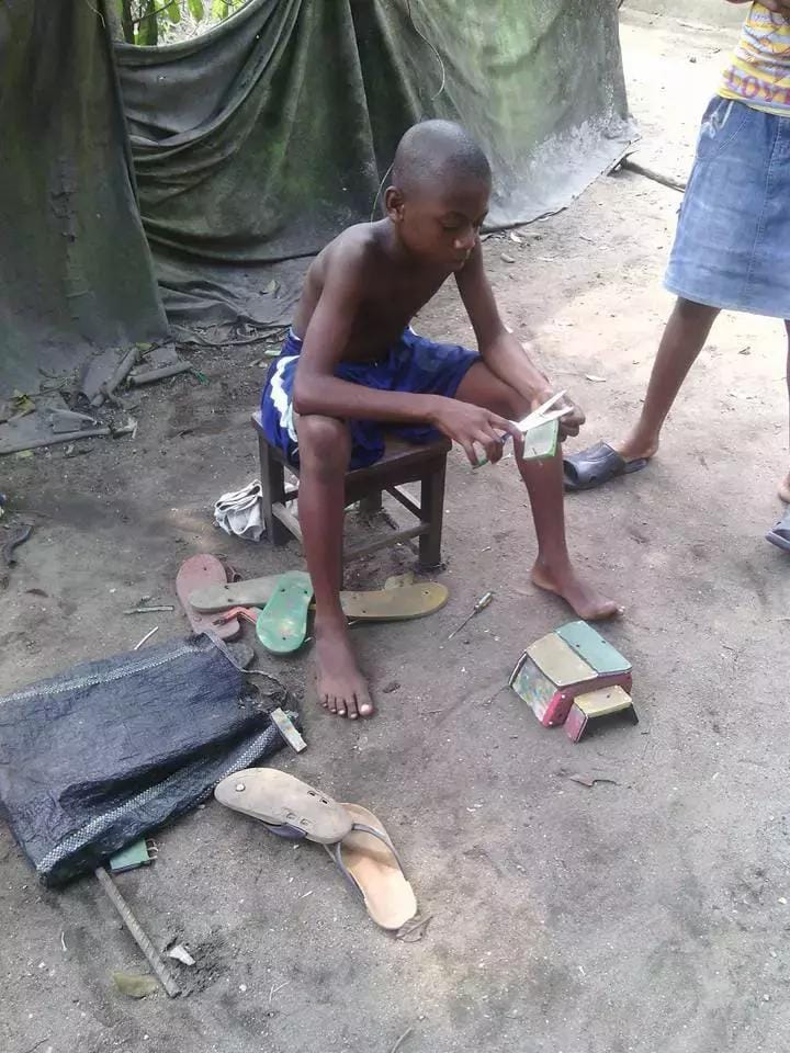 Boy Constructs 'Keke Napep' With Slippers In Port Harcourt (Photos)