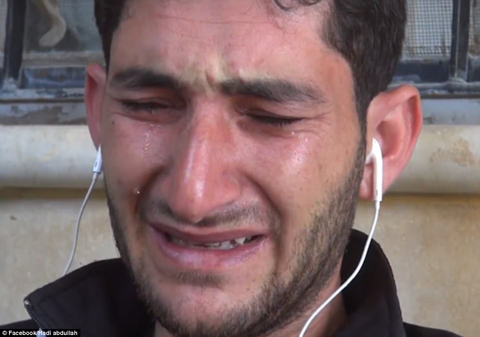 Grief: In a heartbreaking interview, Abdul told of how his relatives' homes were destroyed one by one in a series of suspected Syrian airstrikes - and the agonising moment he discovered his wife and children had died from chemical poisoning