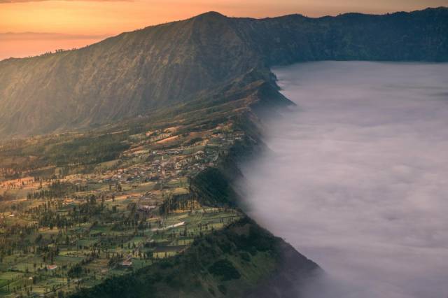 6 -  The morning light comes to Cemoro Lawang, Indonesia.