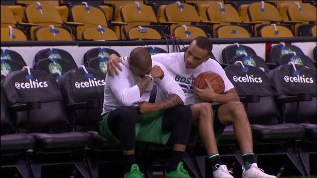 15 -  Avery Bradley comforting Isaiah Thomas before the game against the Bulls…his sister was killed in a car accident the night before.