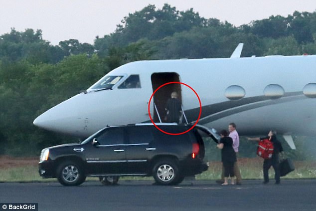 Swift is pictured here boarding the jet in Nashville, Tennessee, after visiting her mother for the US Mother's Day, before flying in to the UK