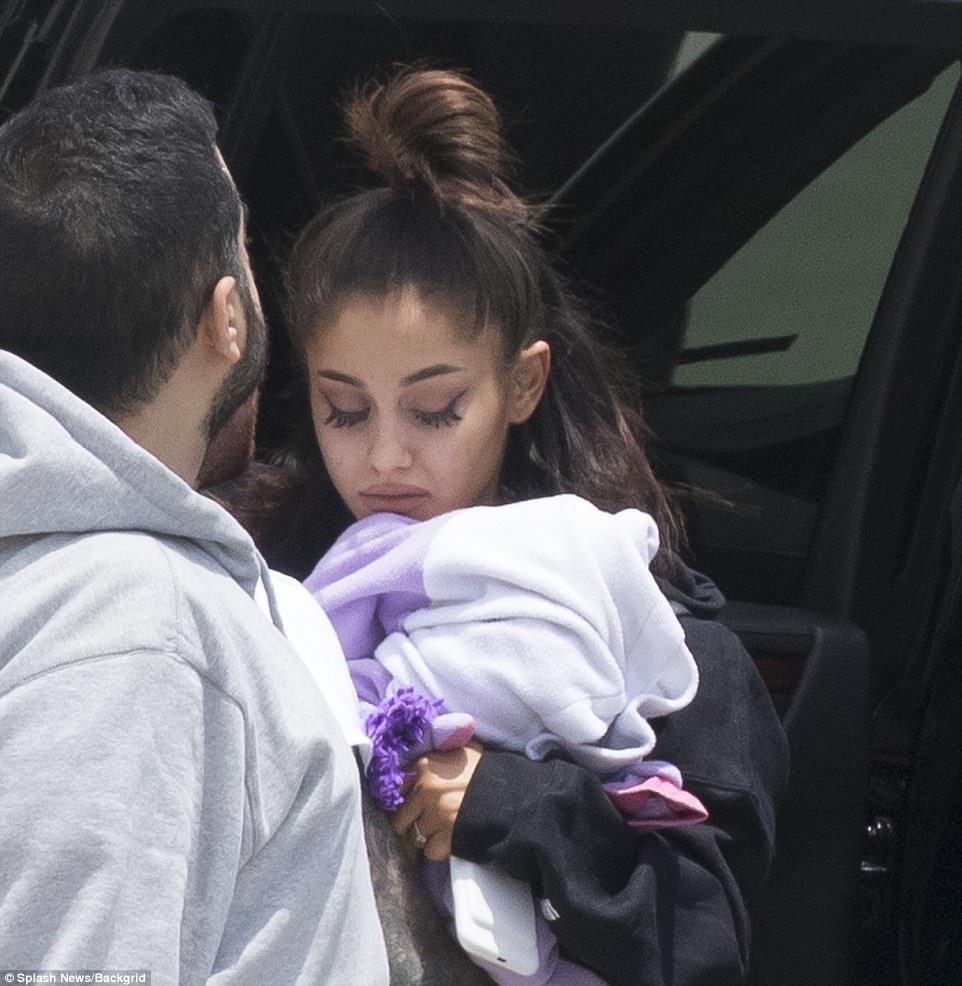 Back home: Ariana Grande was seen for the first time since a suicide bomber set off an improvised device at her concert in Manchester on Monday night