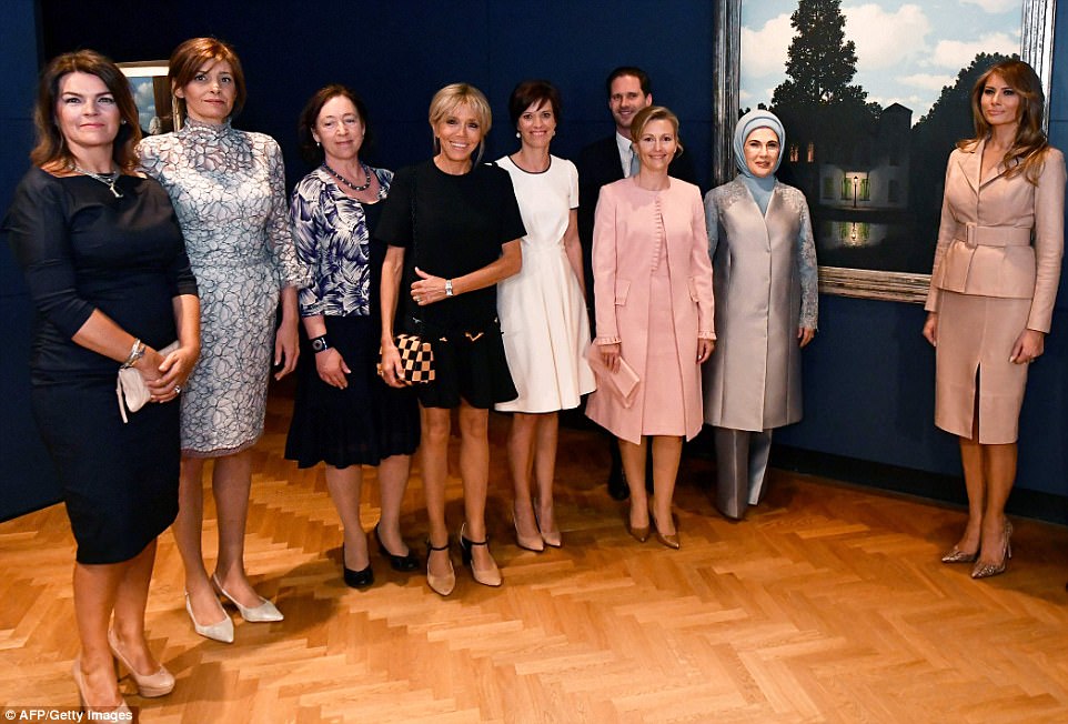 Gauthier Destenay, the husband of Luxembourg's prime minister, Xavier Bettel, posed alongside the group of women for a photo at the Magritte Museum earlier on Thursday