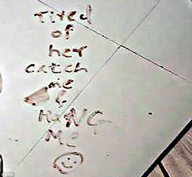 Pictures have emerged of a chilling note written in blood found next to the body of a top detective's wife in India