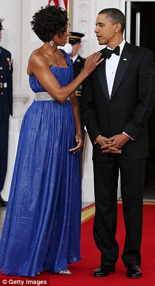 Above the couple is pictured at the state dinner in May 2010